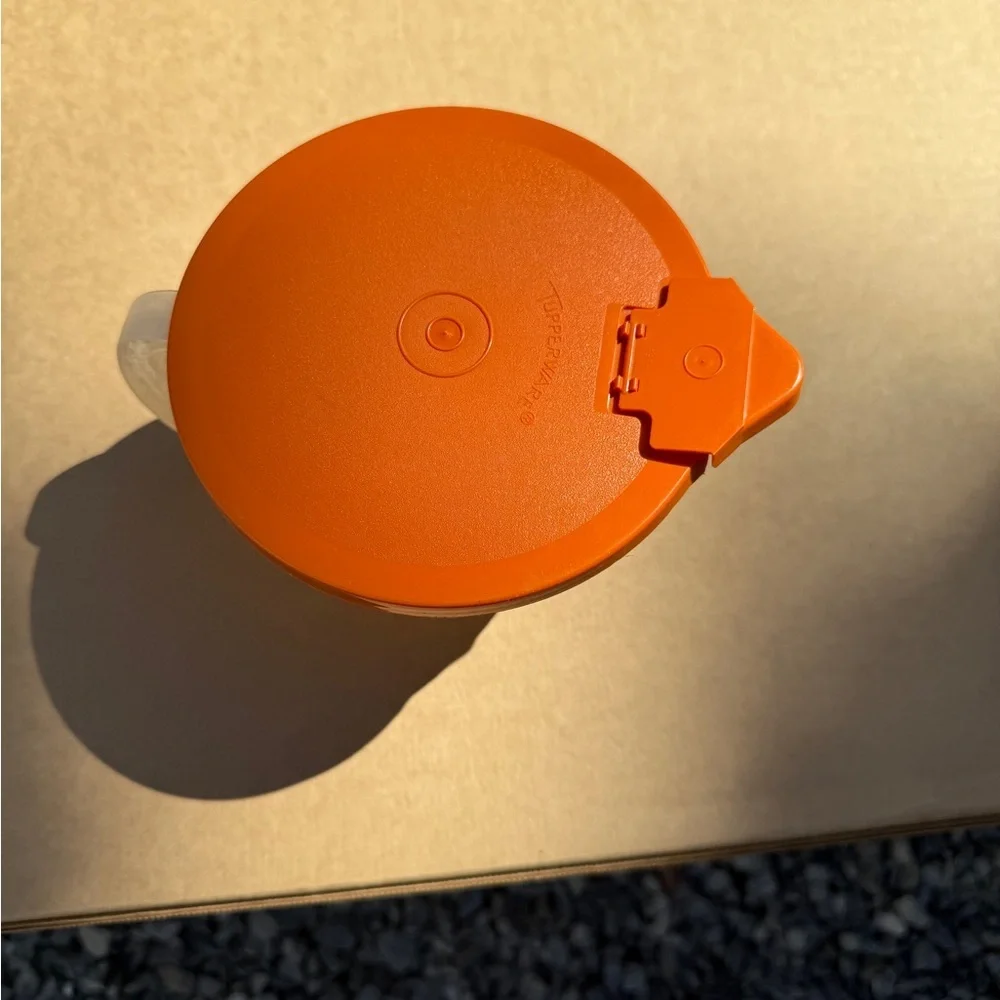 Vintage Tupperware Orange Lidded Measuring Cup